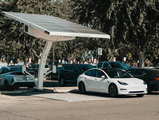 EV charger installed at a residential property alongside solar system